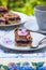 Blackcurrant coconut slice with tea