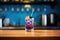 blackcurrant soda on a bar counter with blue backlight