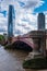 Blackfriars Bridge, crossing the River Thames and One Blackfriars or The Vase or The Boomerang skyscraper in the background. in