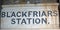 Blackfriars Station old signage against a brick wall