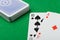 Blackjack.Playing cards on a green background