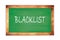 BLACKLIST text written on green school board