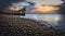 Blackrock diving tower at beautiful morning orange sunrise at Salthill beach in Galway city, Ireland