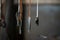 Blacksmith decorative elements hanging at forge, workshop.