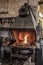 Blacksmith forge oven with fire metal