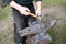 Blacksmith forges horseshoe with hammer on anvil. Ancient craft. Village craft. Blacksmith working metal. Tools for