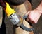 Blacksmith grinding a horseshoe