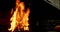 Blacksmith heating metal rod in fire 4k