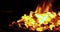 Blacksmith heating metal rod in fire 4k