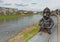 Blacksmith statue on the bridge over Latorica river in Mukacheve town, Ukraine