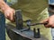 Blacksmith working on a metal detail