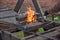 Blacksmiths work with metal, heating it in a fire