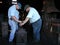Blacksmiths Working at Tourist Attraction