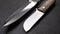 Blade of a large hunting knife close-up isolated
