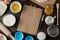 Blakek for recipes. baking ingredients, cookie molds and baking tools on a brown wooden table. view from above. space for text