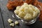 Blanched cauliflower in colander