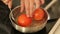 Blanching tomatoes in a stewpan