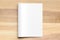 Blank Bi fold A4 size brochure mock up on wooden background. 3D
