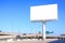 Blank billboard against blue sky for advertisement