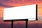 Blank billboard ready for new advertisement on dramatic sunset sky with clouds background