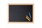 Blank blackboard with colored chalks