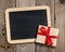 Blank blackboard and gift box