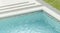 Blank blue rippled water in swimming pool mockup