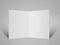 Blank brochure fold flyer Stand On grey Background. Empty White folded Paper Pages standing with shadow