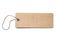 Blank brown cardboard price tag or label with thread isolated