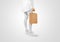 Blank brown craft paper bag design mockup holding hand