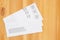 Blank business envelope on a wood desk mockup