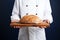 Blank canvas Chef in close up, holding an empty white board