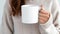 Blank Canvas in Hand: Mug Mockup Magic