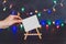 Blank canvas with multicolor festive string lights bokeh and copyspace