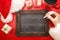 Blank chalkboard with Christmas wishlist ingredients