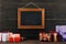 blank chalkboard in frame with gift boxes hanging