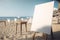 A blank chalkboard sign at a seaside cafe on sand beach, waiting to be filled with advertisements