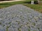 Blank copy space on textured stone paved walkway background