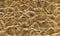 Blank crumpled golden paper textured background isolated