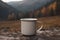 Blank enamel coffee cup mockup, empty camping mug in wild nature, presentation