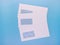 Blank envelopes with address window on blue background. White paper envelopes mockup for business correspondence  postal