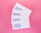 Blank envelopes with address window isolated on pink background. White paper envelopes mockup