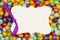Blank gift tag over colorful jellybean candy