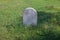 Blank Grave Stone in Grassy Scene