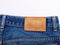 Blank jeans leather label on jean fabric