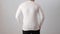Blank long sleeved shirt mock up template, back rear view, Asian man wear plain white t-shirt isolated on white. Tee design mockup