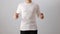 Blank long sleeved shirt mock up template, front view, Asian man wear plain white t-shirt isolated on white. Tee design mockup