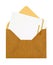 Blank message or invitation card with paper clip and brown manila envelope, close up