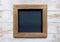 A blank mock-up of a wooden framed blackboard