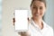 Blank modern tablet in hand of blurred woman